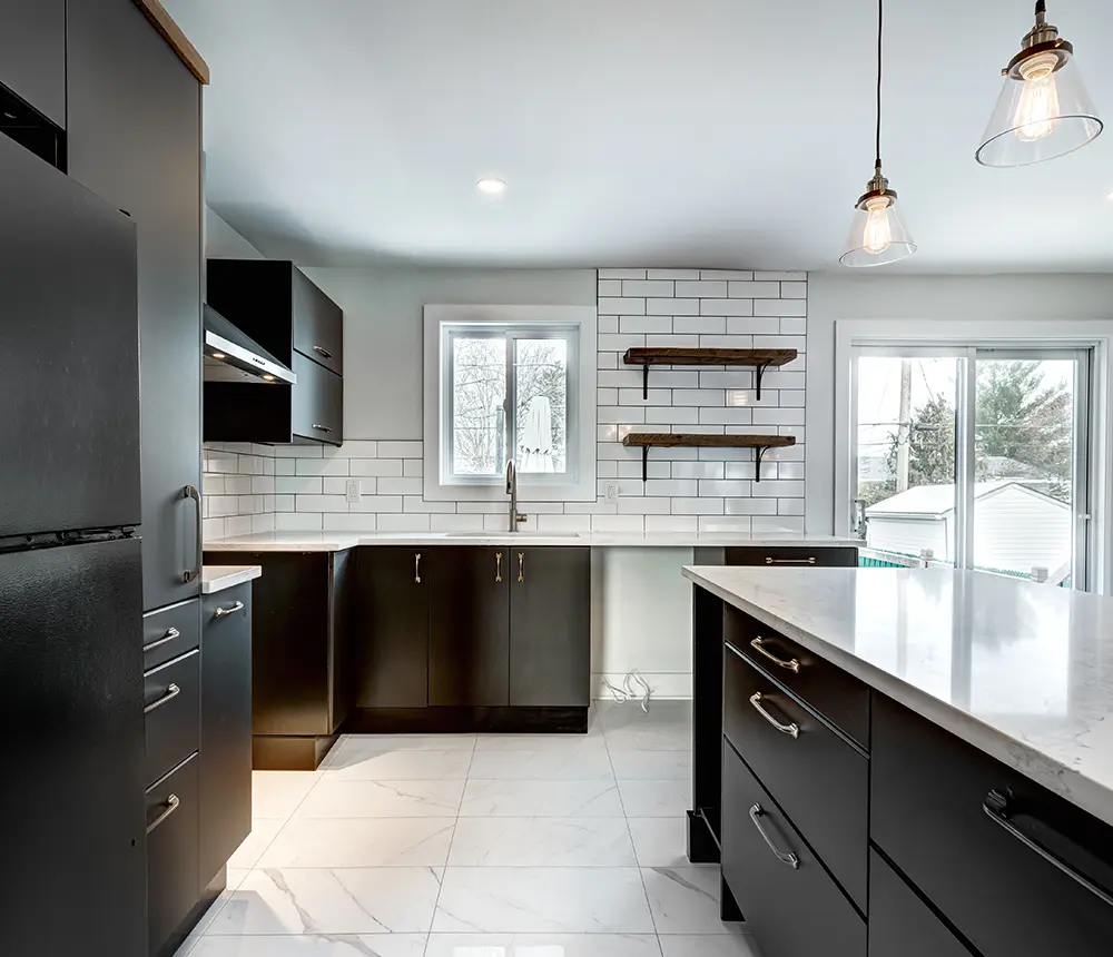 black cabinets with white marble pattern countertops small modern kitchen
